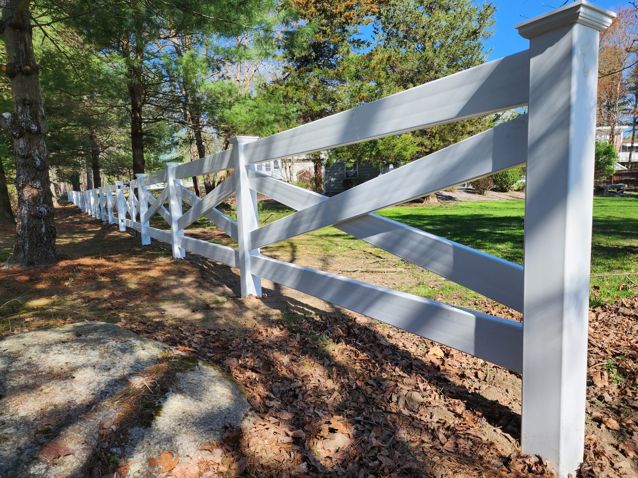 Crossbuck Post And Rail Vinyl Fence Installation | Farm Fence Installation | Residential Fence Company | Tripp Fence Company